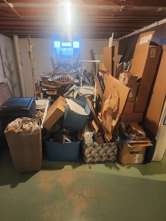 Roll-off dumpster container at job site for Roll Off Dumpster Rental in Tell City